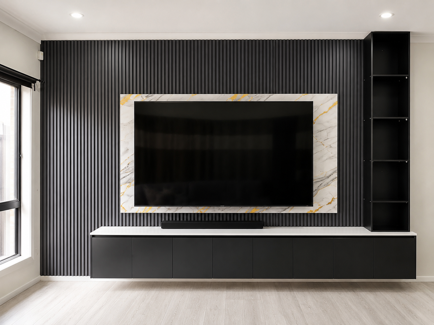 Dark entertainment wall with built-in cabinetry