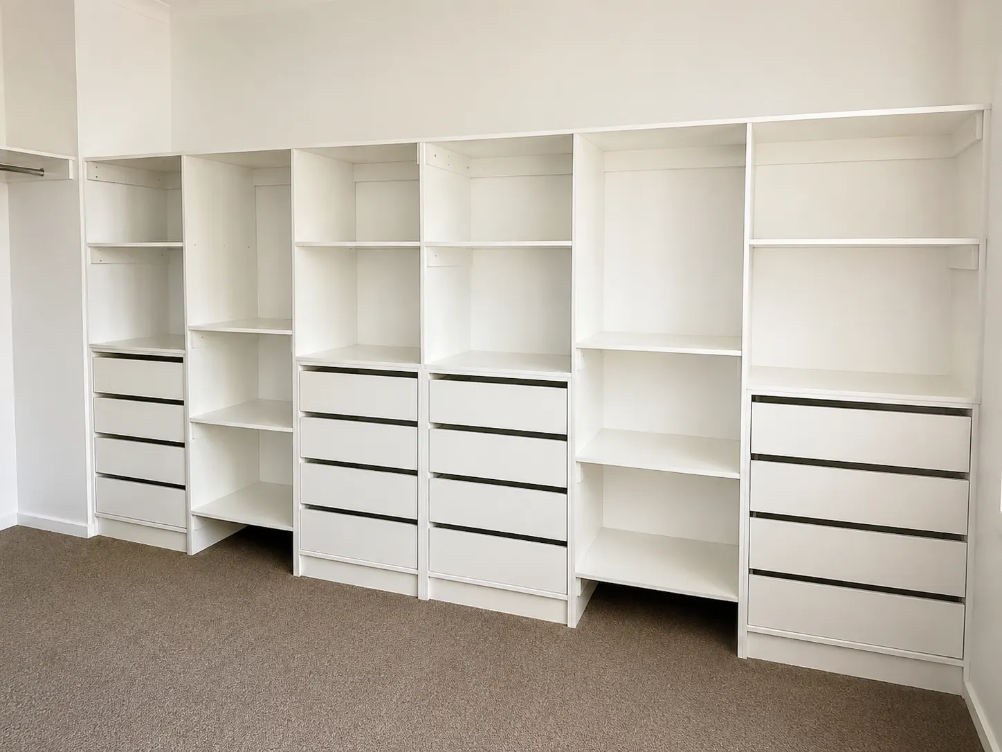 Custom white built-in wardrobe and drawer storage