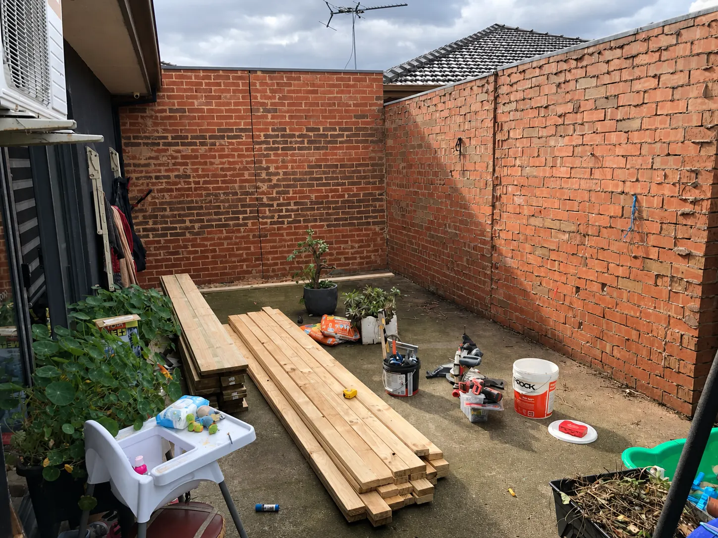 Brick courtyard before the new deck and gazebo were completed