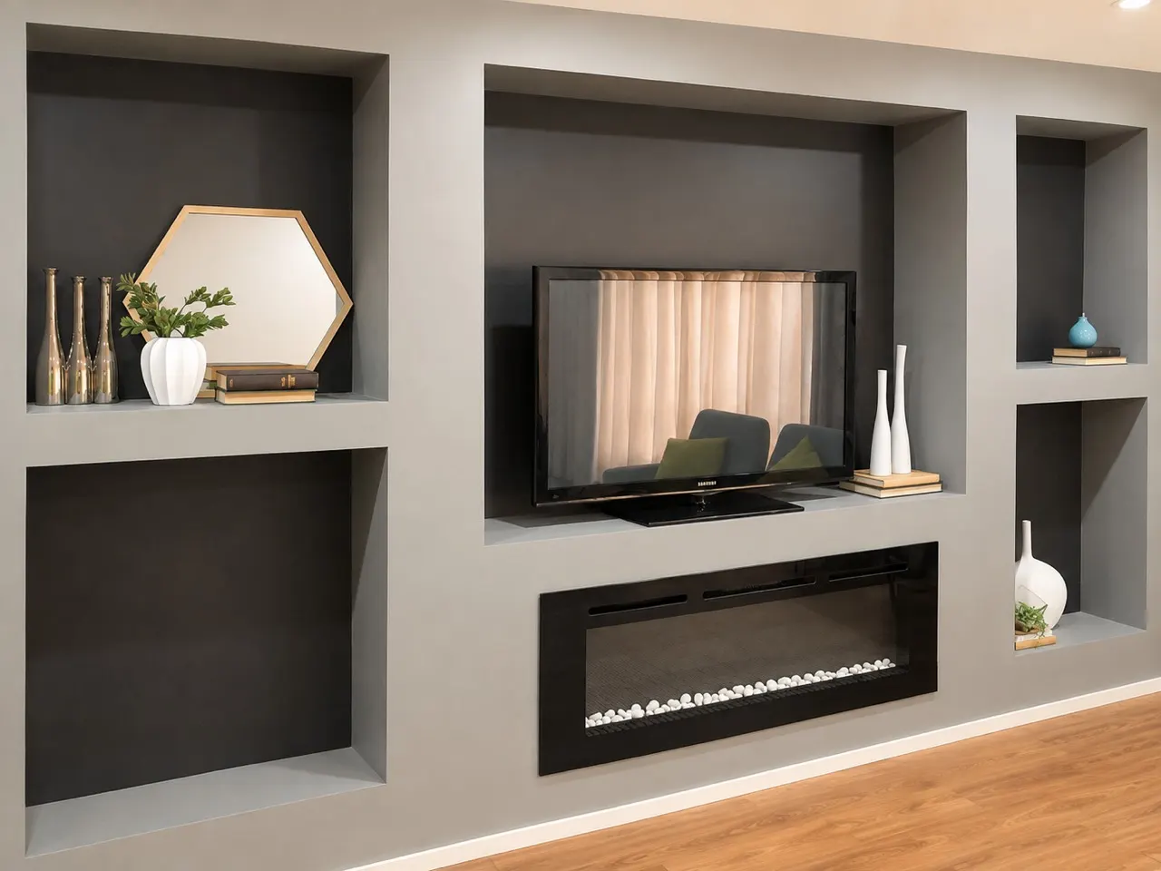 Finished grey entertainment wall with display niches, television and linear fireplace